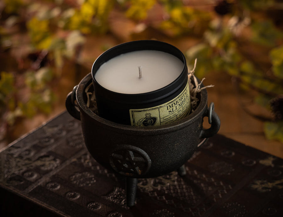 Witchcraft themed Immortal Slumber scented black tinned soy wax candle