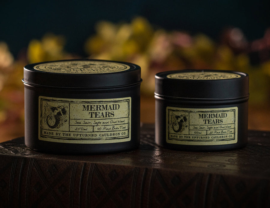 Witchcraft themed Mermaid Tears scented black tinned soy wax candle